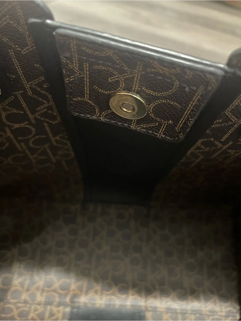 (Not sure if it’s authenticCalvin Klein Black Leather Laptop Tote with Gold Logo